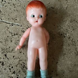 Knickerbocker plastic co vintage plastic rattle doll arms move but leges do not